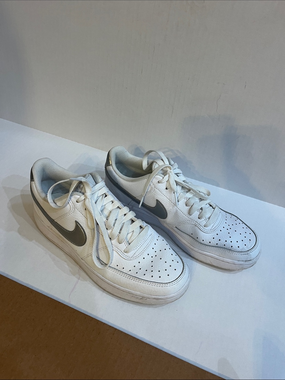 Nike White Low-Top Sneakers with Gray Swoosh